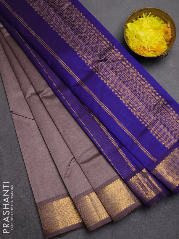 Silk cotton saree grey and royal blue with plain body and temple zari woven border
