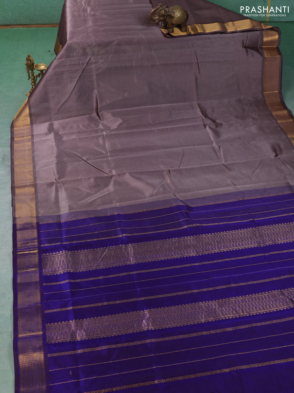 Silk cotton saree grey and royal blue with plain body and temple zari woven border