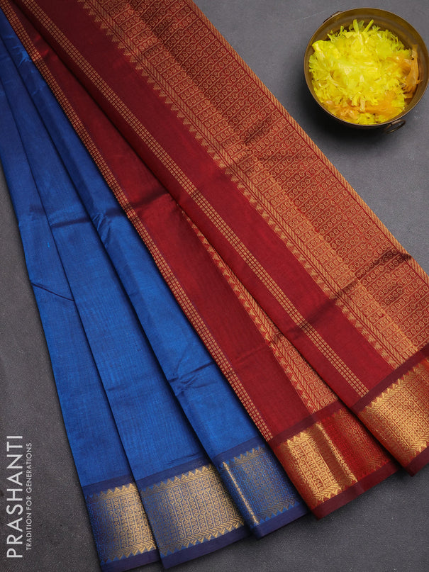 Silk cotton saree peacock blue and maroon with plain body and temple zari woven border