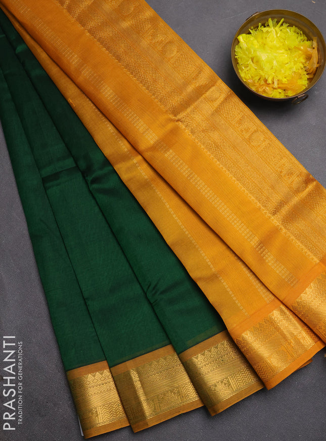 Silk cotton saree bottle green and mustard yellow with plain body and temple zari woven border