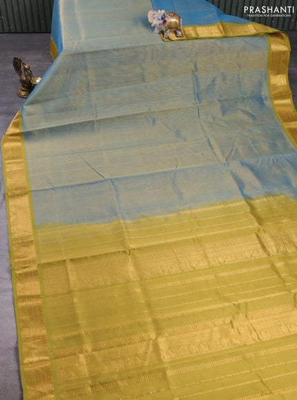 Silk cotton saree teal blue and mustard green with plain body and temple zari woven border