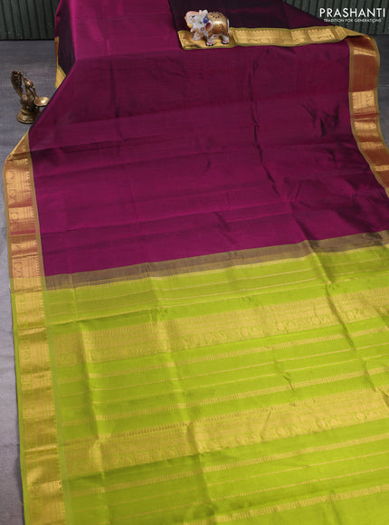 Silk cotton saree deep wine and light green with plain body and zari woven border