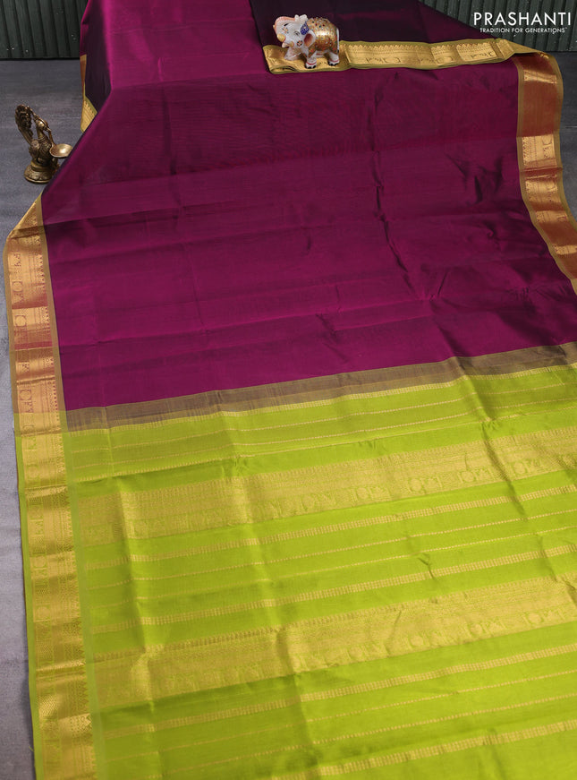 Silk cotton saree deep wine and light green with plain body and zari woven border