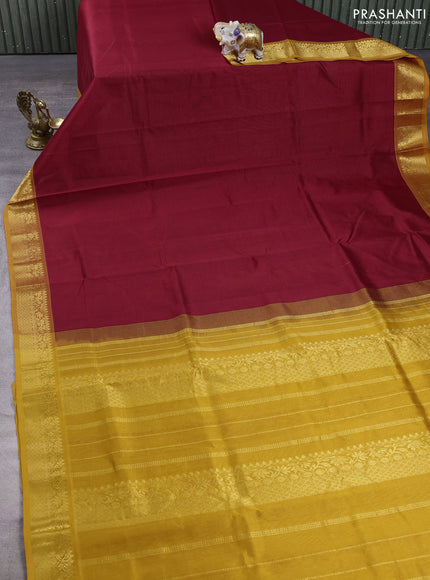 Silk cotton saree maroon and mustard yellow with plain body and zari woven border