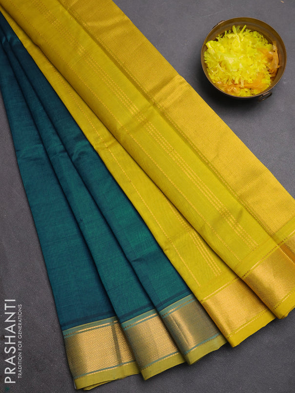 Silk cotton saree peacock green and lime yellow with plain body and zari woven border