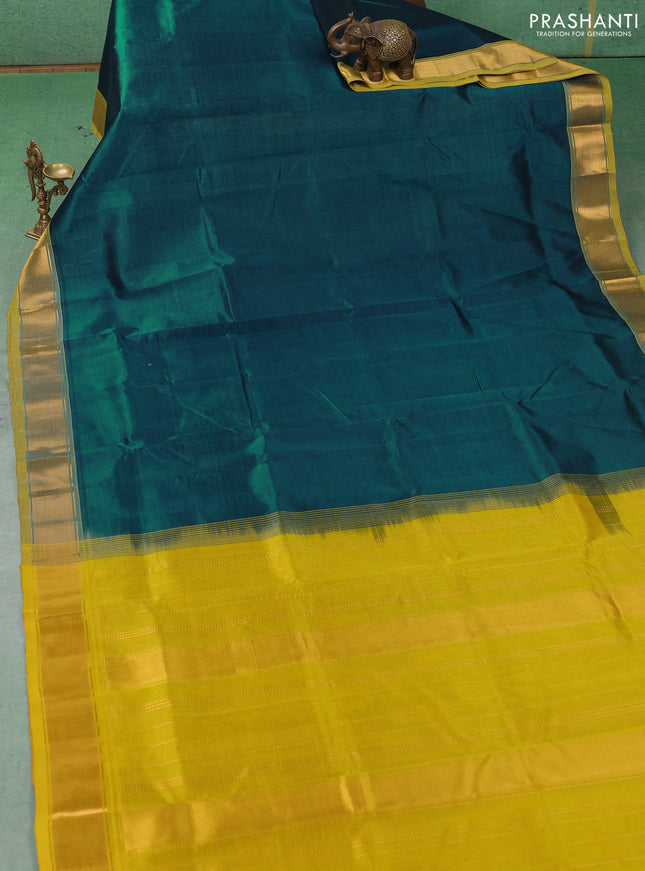 Silk cotton saree peacock green and lime yellow with plain body and zari woven border