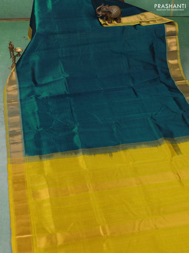 Silk cotton saree peacock green and lime yellow with plain body and zari woven border
