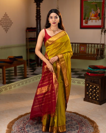 Silk cotton saree mustard green and maroon with plain body and zari woven border