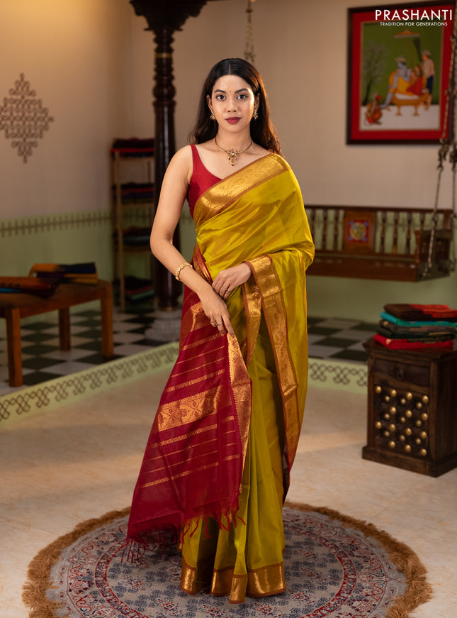 Silk cotton saree mustard green and maroon with plain body and zari woven border