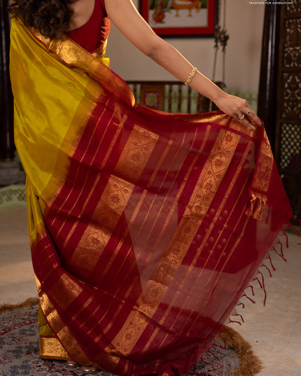 Silk cotton saree mustard green and maroon with plain body and zari woven border