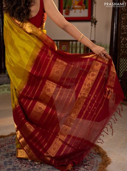 Silk cotton saree mustard green and maroon with plain body and zari woven border
