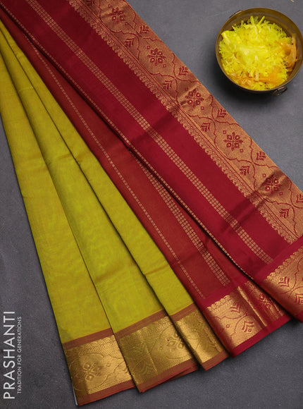 Silk cotton saree mustard green and maroon with plain body and zari woven border