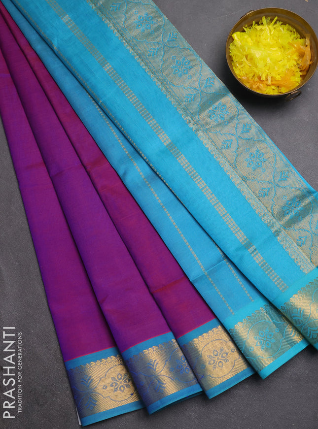 Silk cotton saree purple and cs blue with plain body and zari woven border