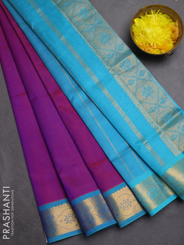 Silk cotton saree purple and cs blue with plain body and zari woven border