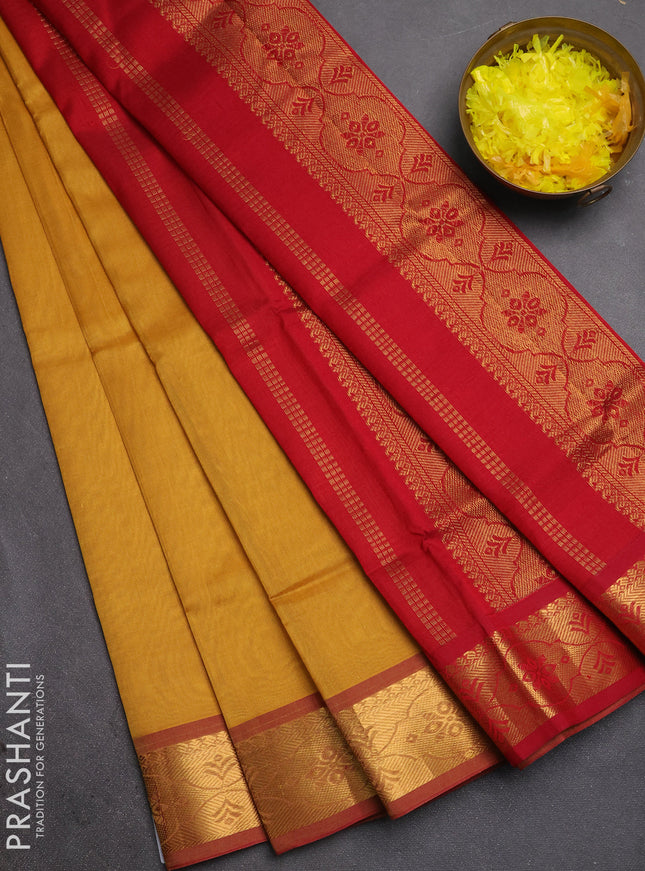 Silk cotton saree sandal and maroon with plain body and zari woven border