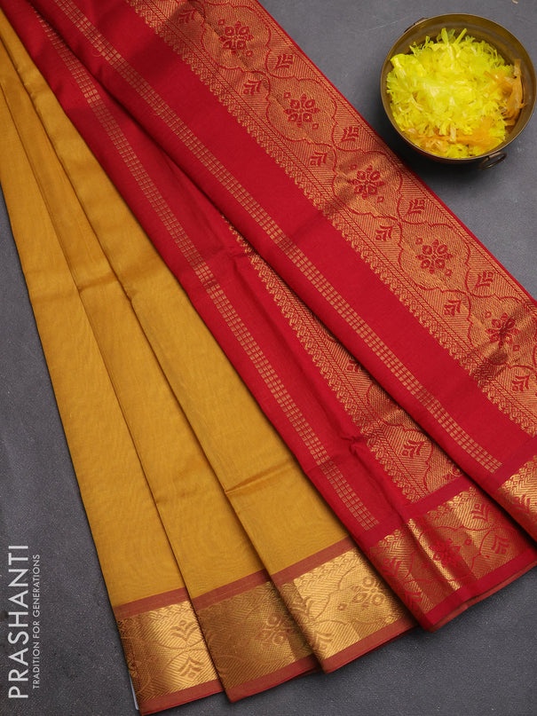 Silk cotton saree sandal and maroon with plain body and zari woven border