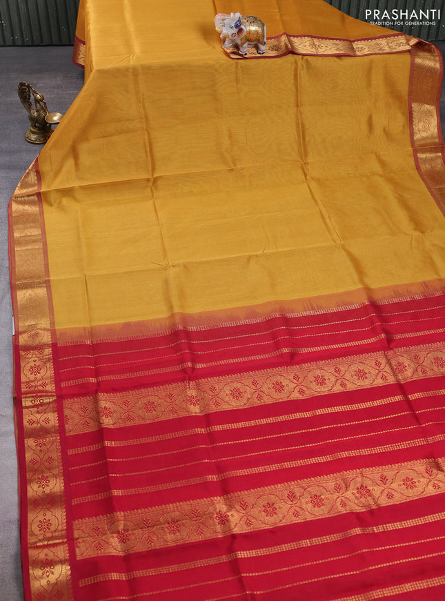 Silk cotton saree sandal and maroon with plain body and zari woven border