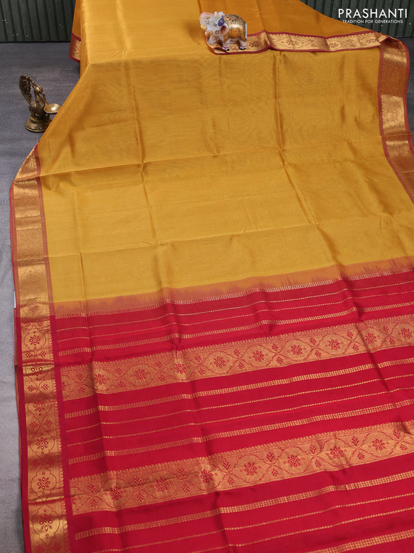 Silk cotton saree sandal and maroon with plain body and zari woven border