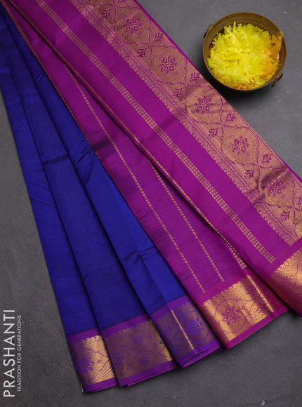 Silk cotton saree royal blue and purple with plain body and zari woven border