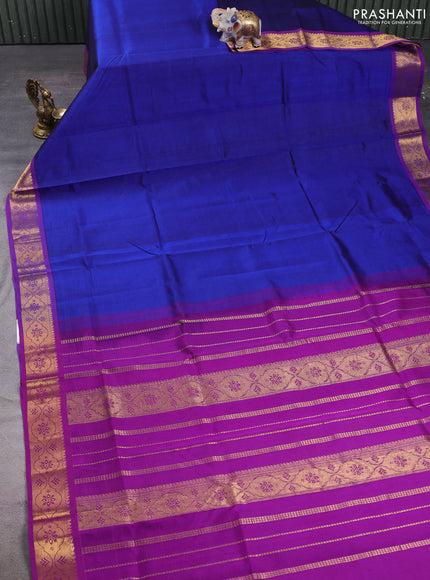 Silk cotton saree royal blue and purple with plain body and zari woven border
