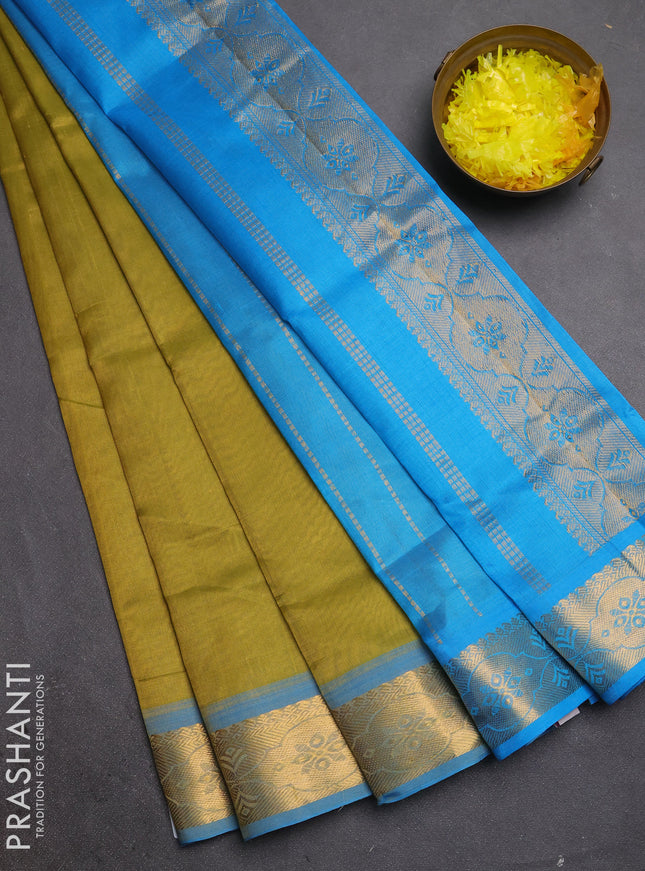 Silk cotton saree mehendi green and cs blue with plain body and zari woven border