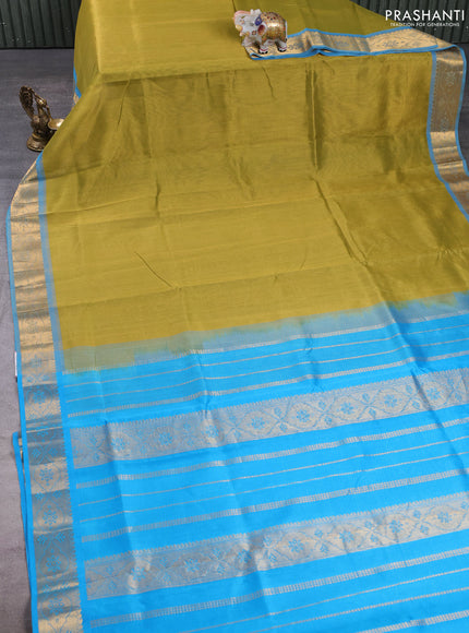 Silk cotton saree mehendi green and cs blue with plain body and zari woven border