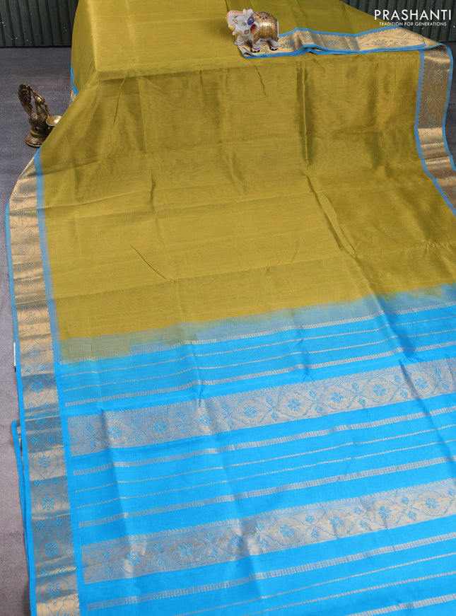 Silk cotton saree mehendi green and cs blue with plain body and zari woven border