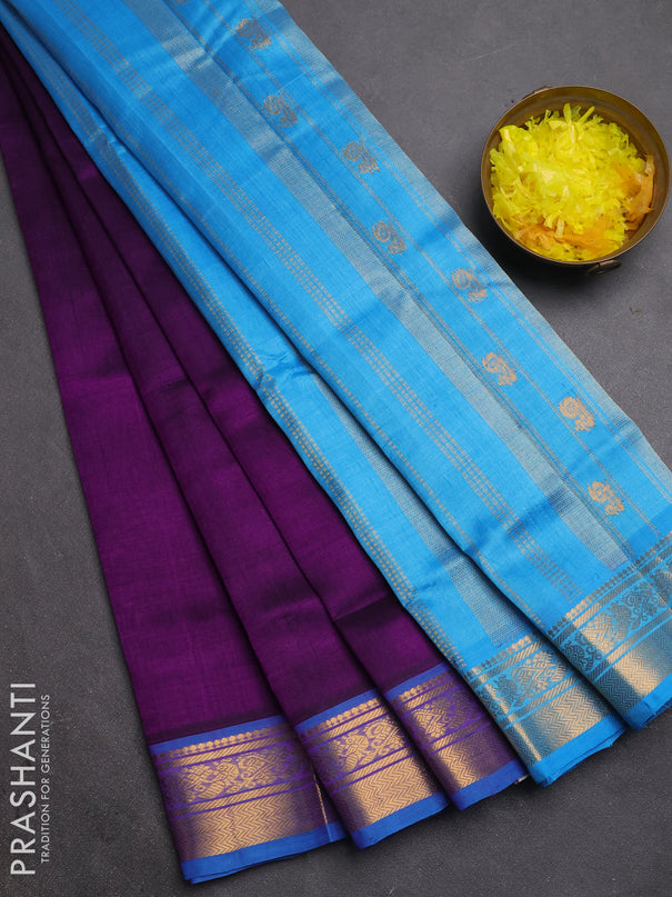 Silk cotton saree purple and cs blue with plain body and zari woven border