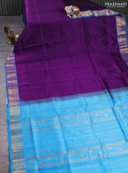 Silk cotton saree purple and cs blue with plain body and zari woven border