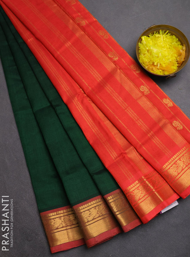 Silk cotton saree bottle green and red with plain body and zari woven border