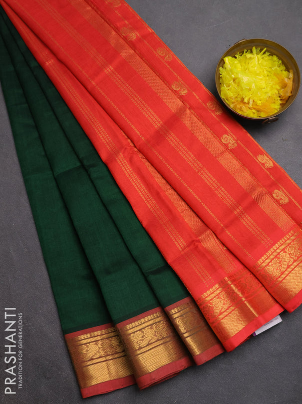 Silk cotton saree bottle green and red with plain body and zari woven border