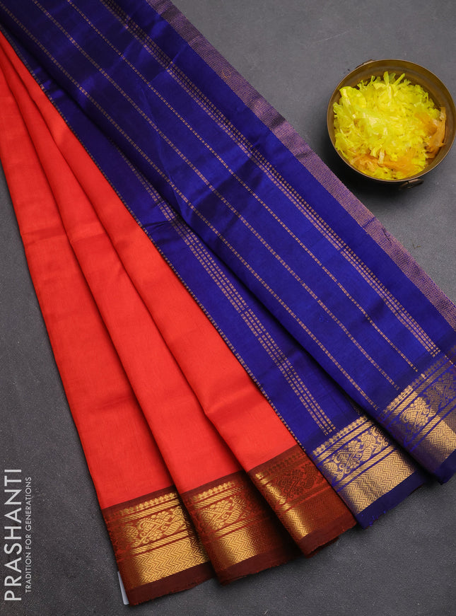 Silk cotton saree red and blue with plain body and zari woven border