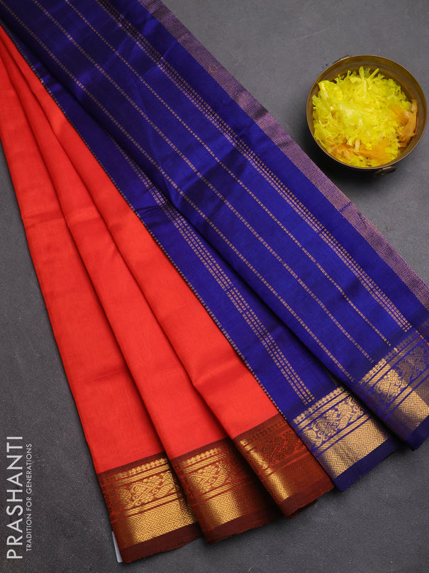 Silk cotton saree red and blue with plain body and zari woven border