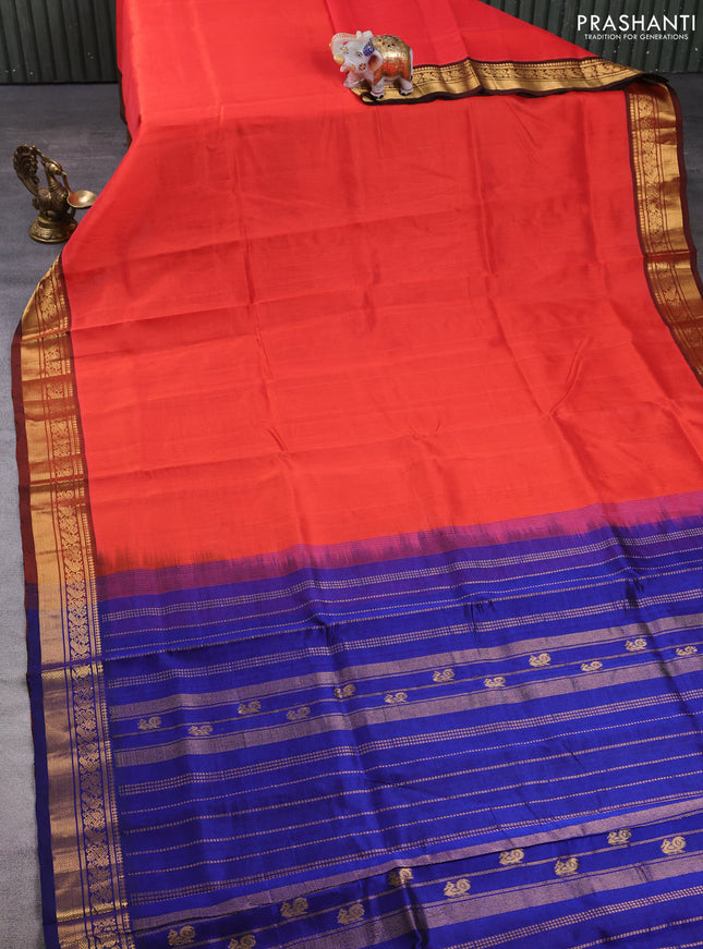 Silk cotton saree red and blue with plain body and zari woven border