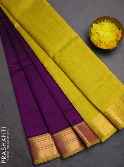 Silk cotton saree purple and lime green with plain body and zari woven border