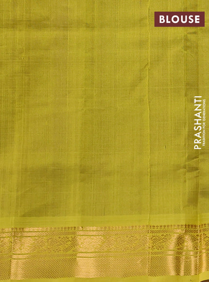 Silk cotton saree purple and lime green with plain body and zari woven border
