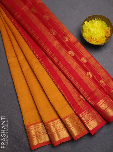 Silk cotton saree mustard yellow and red with plain body and zari woven border