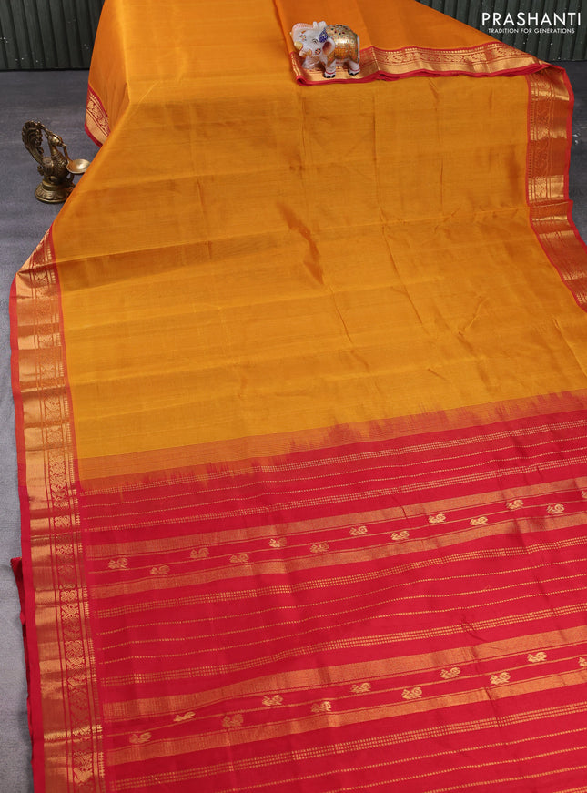 Silk cotton saree mustard yellow and red with plain body and zari woven border