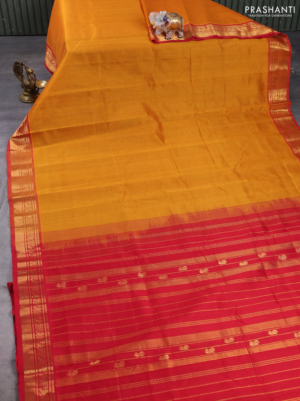 Silk cotton saree mustard yellow and red with plain body and zari woven border