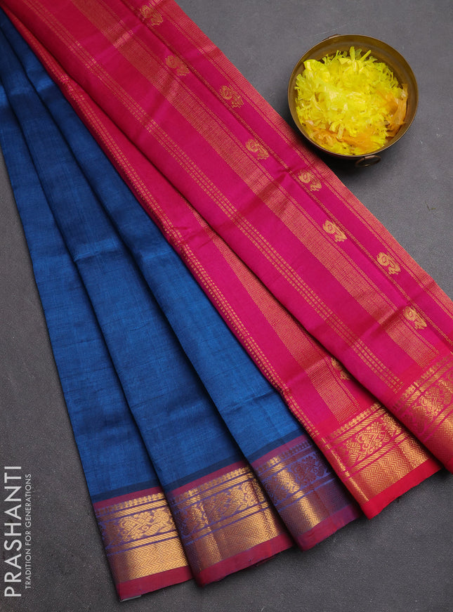 Silk cotton saree peacock blue and pink with plain body and zari woven border