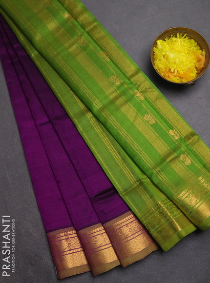 Silk cotton saree purple and light green with plain body and zari woven border