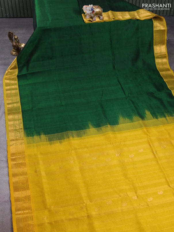 Silk cotton saree bottle green and mustard yellow with plain body and zari woven border