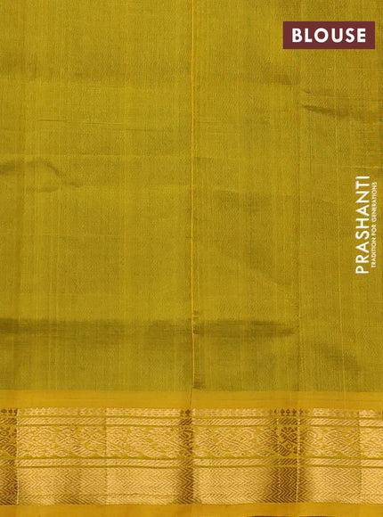 Silk cotton saree bottle green and mustard yellow with plain body and zari woven border