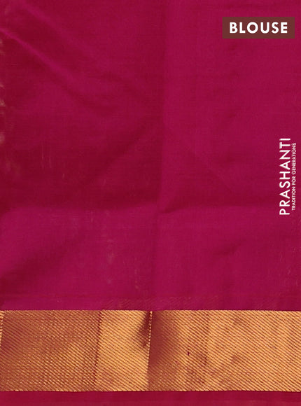 Silk cotton saree pale yellow and magenta pink with plain body and zari woven border