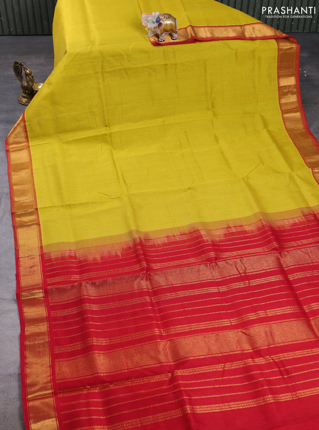 Silk cotton saree lime yellow and red with plain body and zari woven border