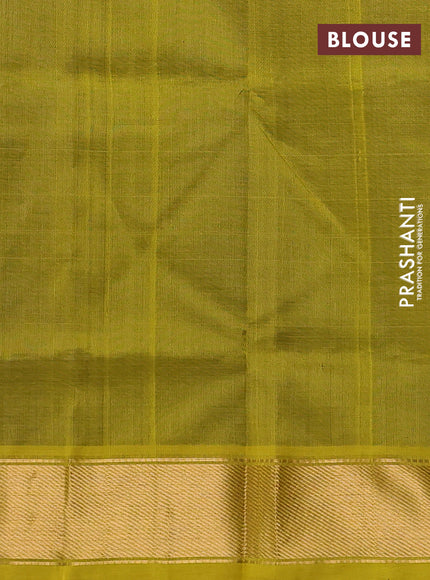Silk cotton saree blue and mustard green with plain body and zari woven border