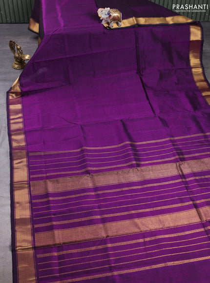 Silk cotton saree purple with plain body and zari woven border