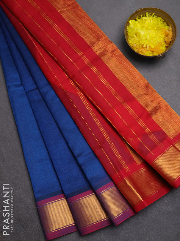 Silk cotton saree peacock blue and maroon with plain body and zari woven border