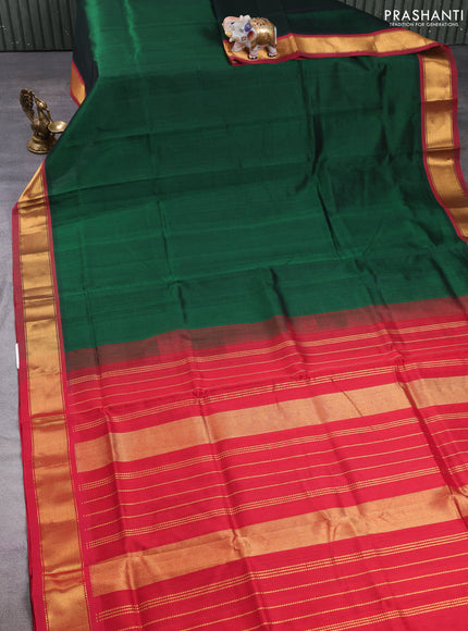 Silk cotton saree bottle green and maroon with plain body and zari woven border
