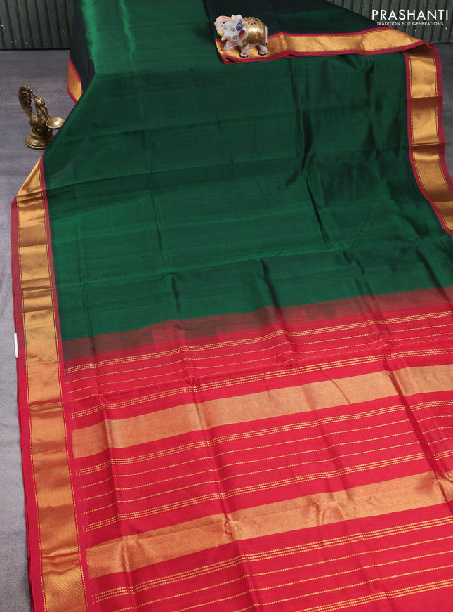 Silk cotton saree bottle green and maroon with plain body and zari woven border